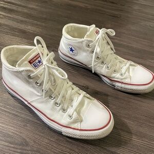 White Mid-top converse sneaker